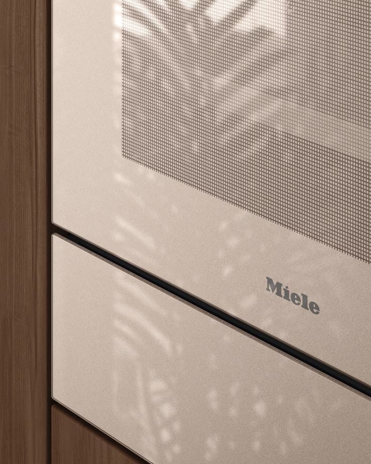 Detail van een Miele oven met glazen front