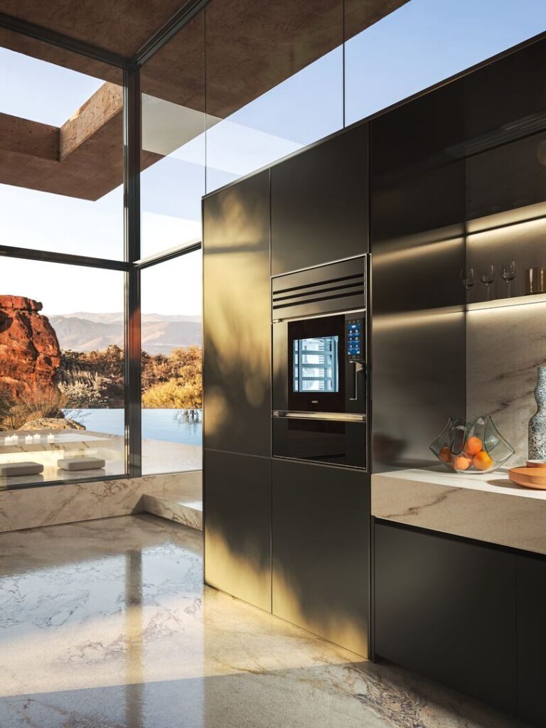 Unox Casa SuperOven ingebouwd in een donkere kastenwand met uitzicht op het landschap