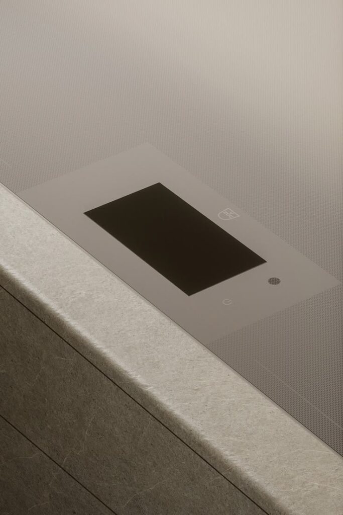 Detail van V-ZUG inbouwapparatuur in een stenen werkblad